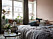 Cozy bed and pink painted walls. Scandinavian interior decoration ideas and inspiration.
