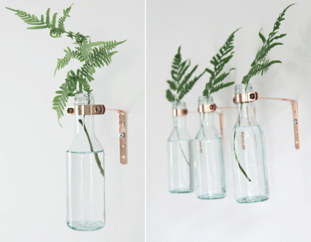 Via: <a href="https://www.etsy.com/ie/listing/188334072/copper-and-glass-bottle-sconce-set-of?ref=market" target="_blank" rel="noopener">Etsy</a> 09. vaserglas