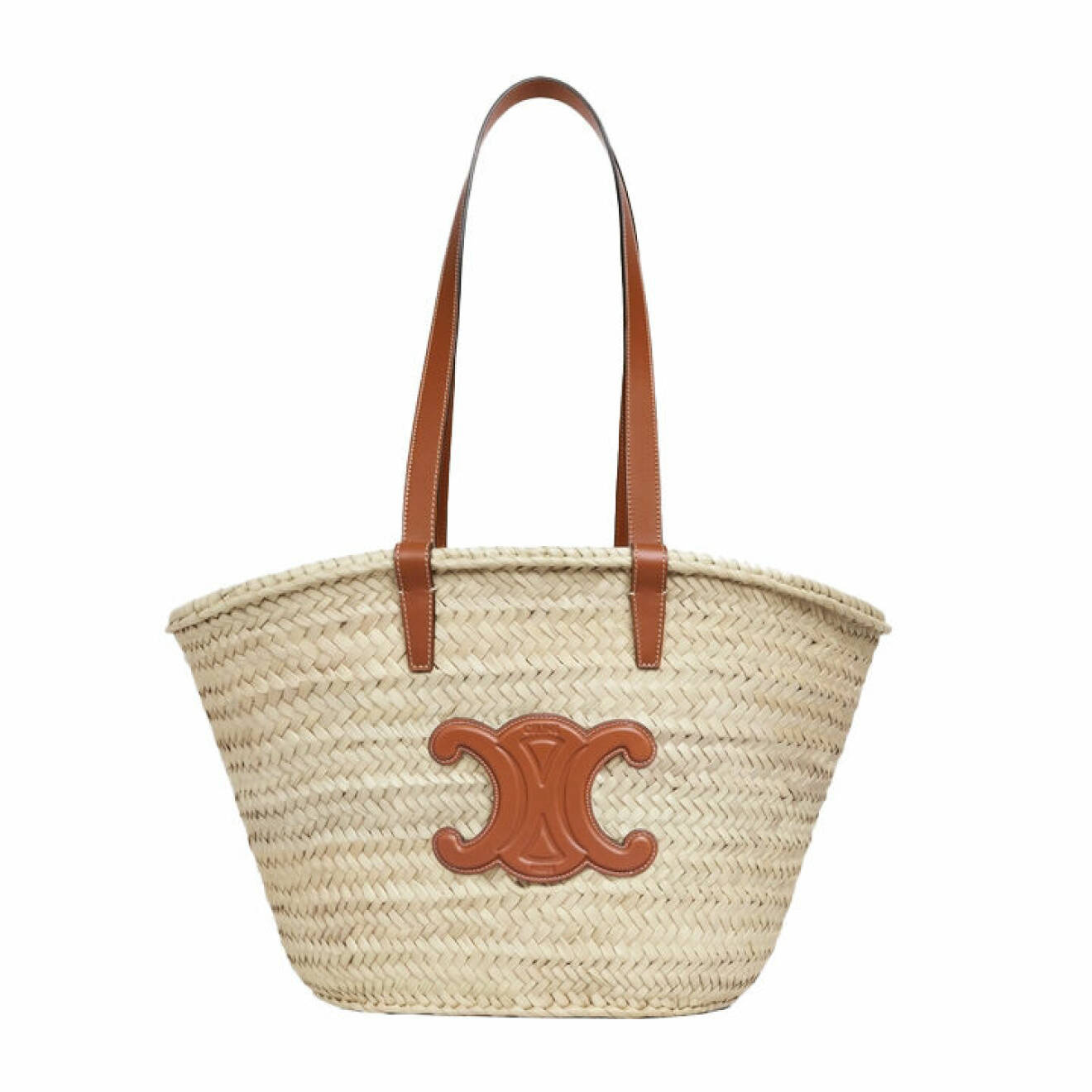 Handflätad väska av palmblad med läderhandtag i brunt och Celine emblem från Celine.