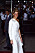 Diana i en vit glittrig klänning vid världspremiären av James Bond A License To Kill.