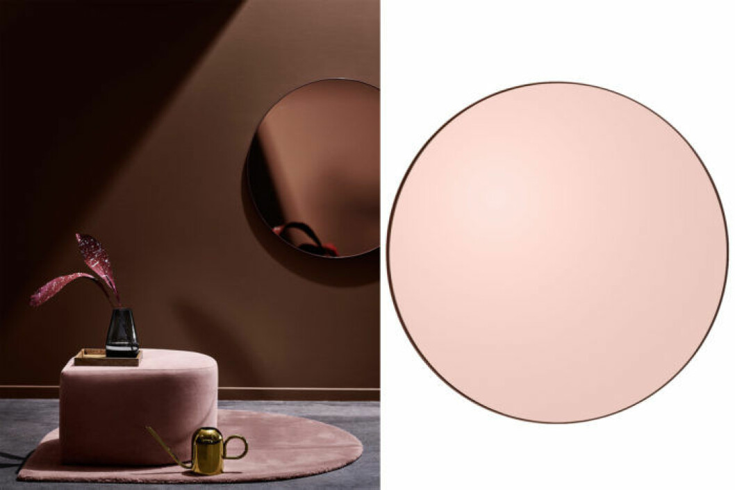 Trendigt rund spegel i en svagt rosa nyans.