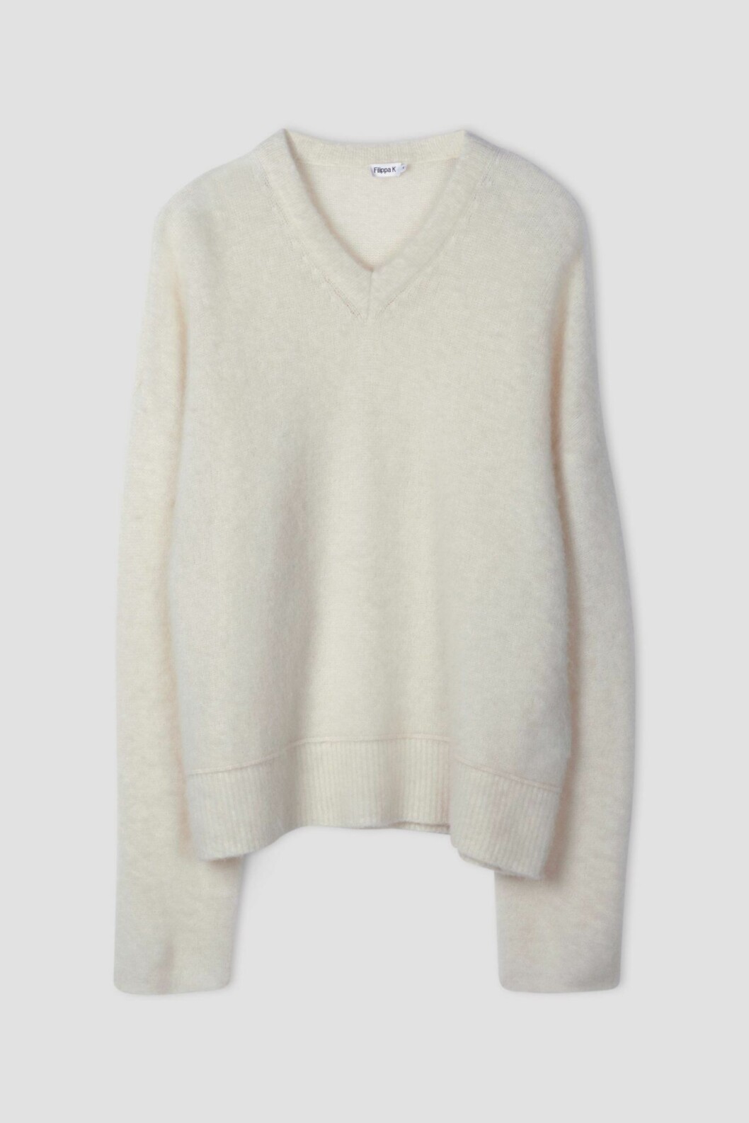 Mysig stickad tröja att bära till jeans dagtid och till tights under yogan.