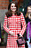 Kate i röd och vitmönstrad kappa under besöket i Sverige.