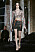 Kort läderkjol med brunt läderbälte från Acne Studios.