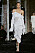 Vit draperad klänning från Acne Studios.