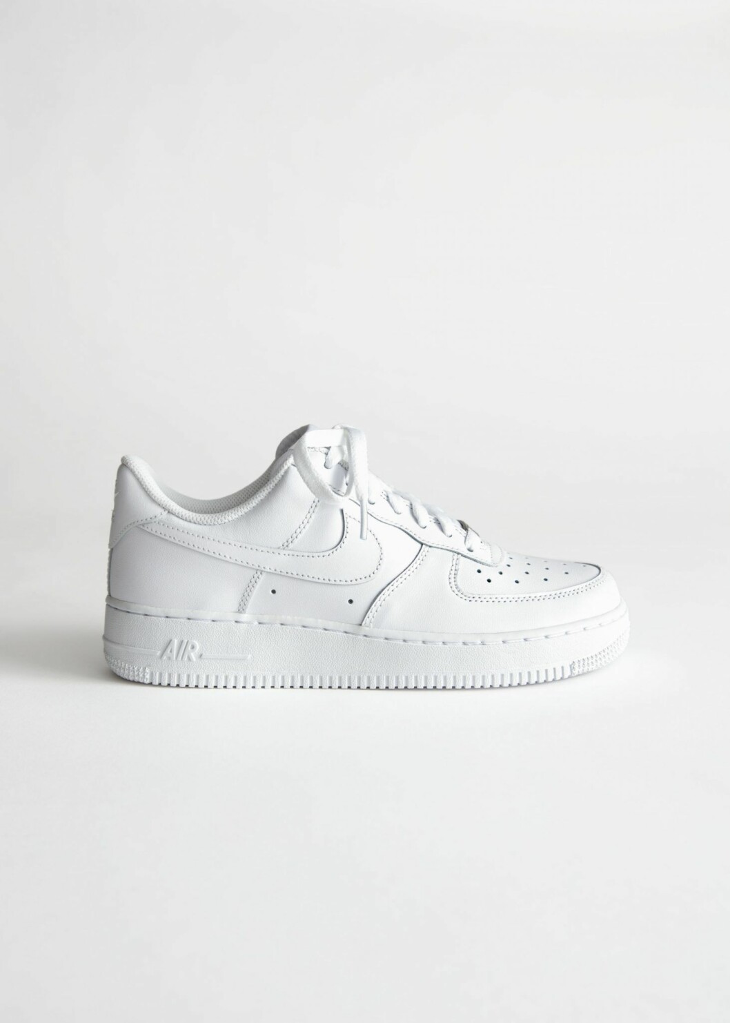 Vita sneakers från Nike.