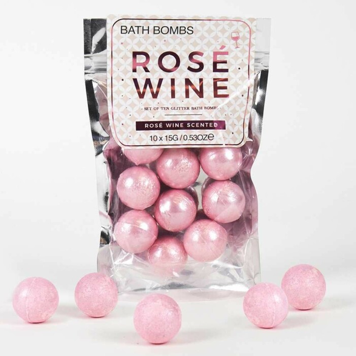 rosa badbomber som luktar rosévin ligger i en påse