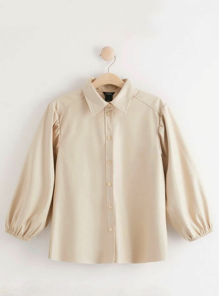beige-blus-laderimitation