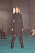 Brun kappa med höga skinnstövlar från Bottega Veneta kollektion FW22