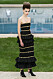 Chanel Haute Couture Paris, svart klänning med gulddetaljer.