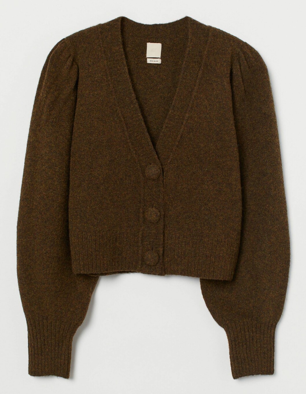 Kort kofta med klädda knappar från H&M.