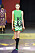 Kort grön klänning med höga stövlar från Dior.