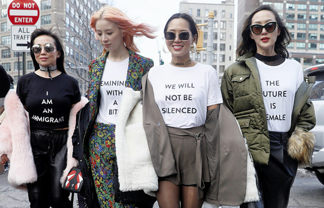 Foto: IBL Kvinnor med tröjor med texten " We will not be silenced" och " The future is female"