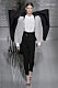 Givenchy Haute Couture SS19, kostymbyxa och vit blus.