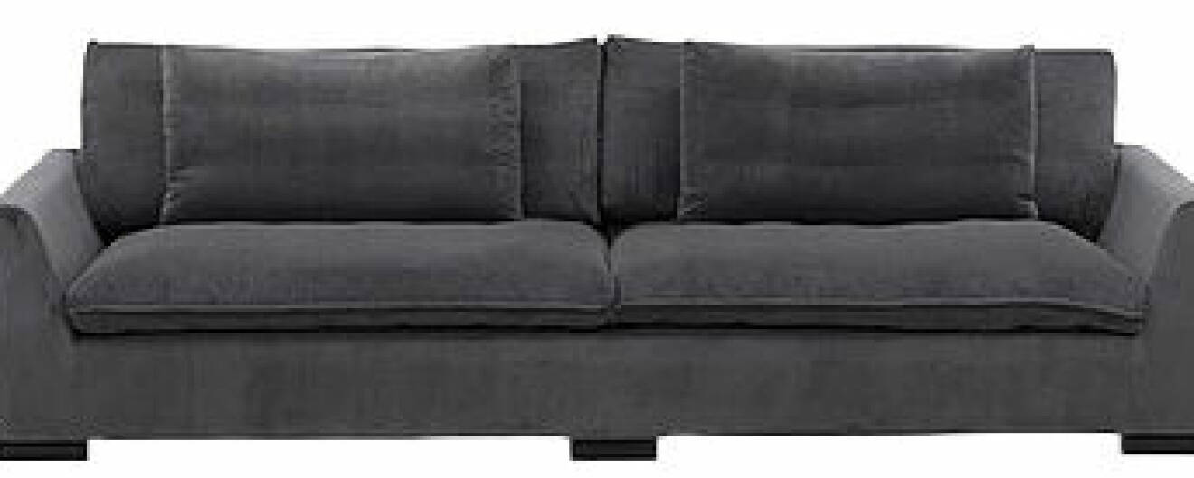 grå djup soffa med kuddar
