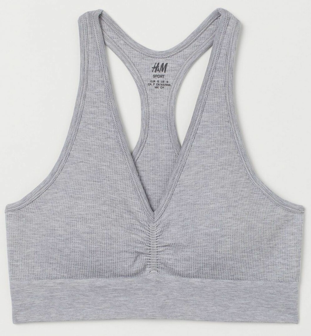 Sömlös behå i ribbat funktionsmaterial från H&M