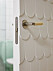 Badrumsdörr med lekfulla detaljer i lägenheten i Stockholm