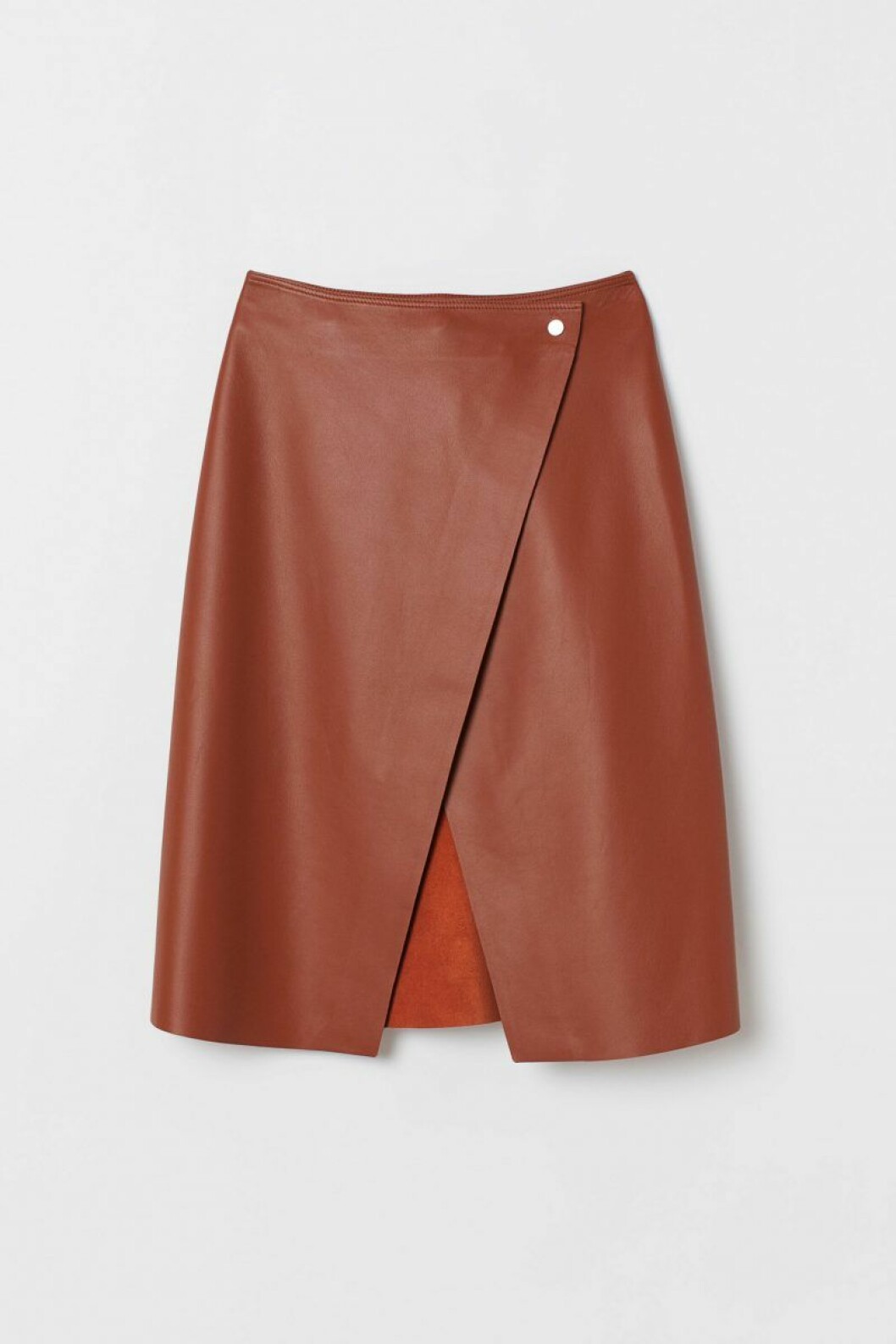 Snygg A-linjerad omlottkjol med hårda kanter och mjukt läder från H&M Premium Quality.