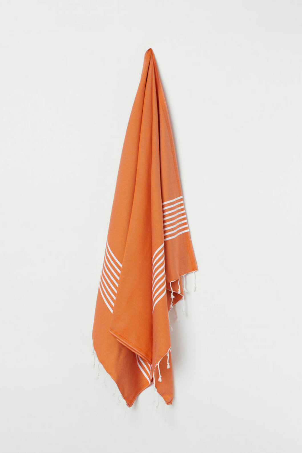 Bomullsfilt i orange från H&M Home.