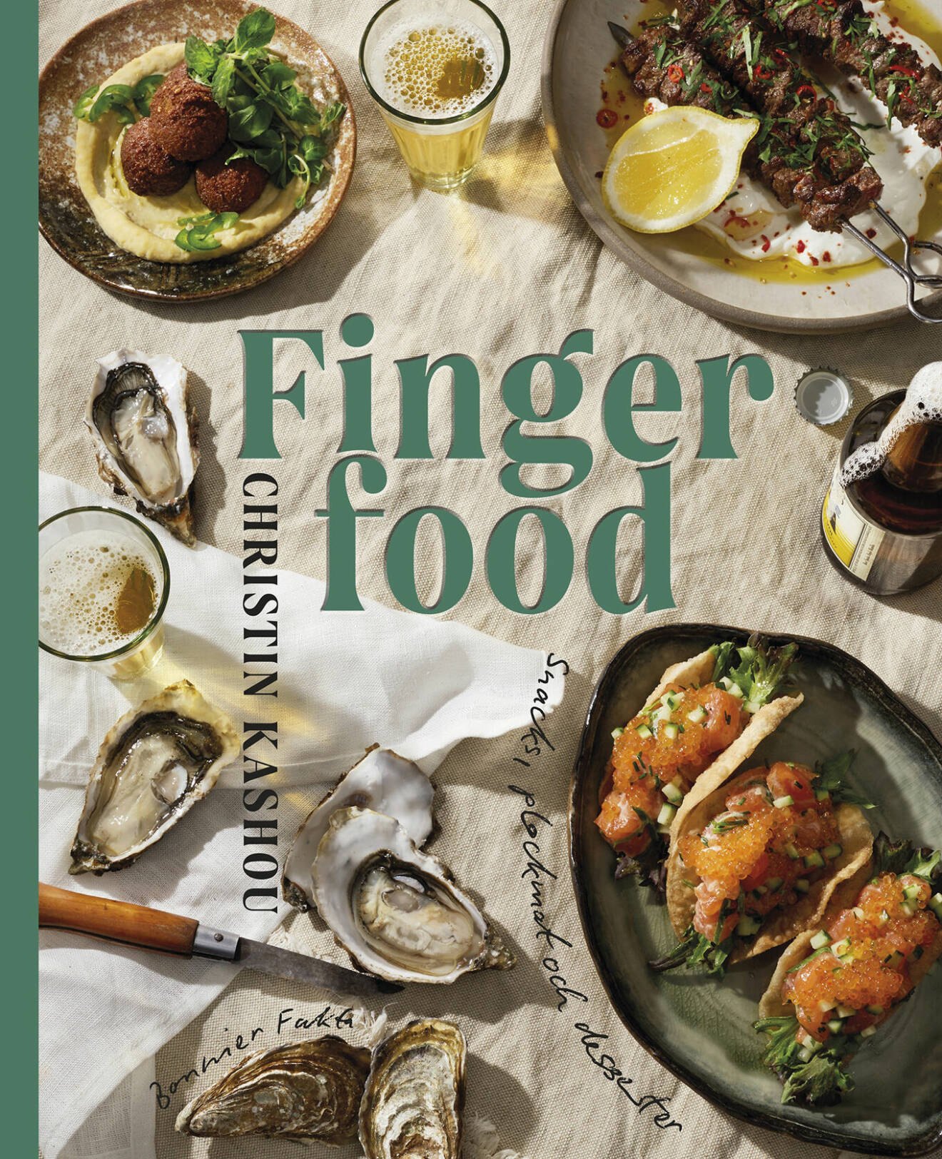 Man kan inte låta bli att bli hungrig när man bländrar i nya kokboken Finger food