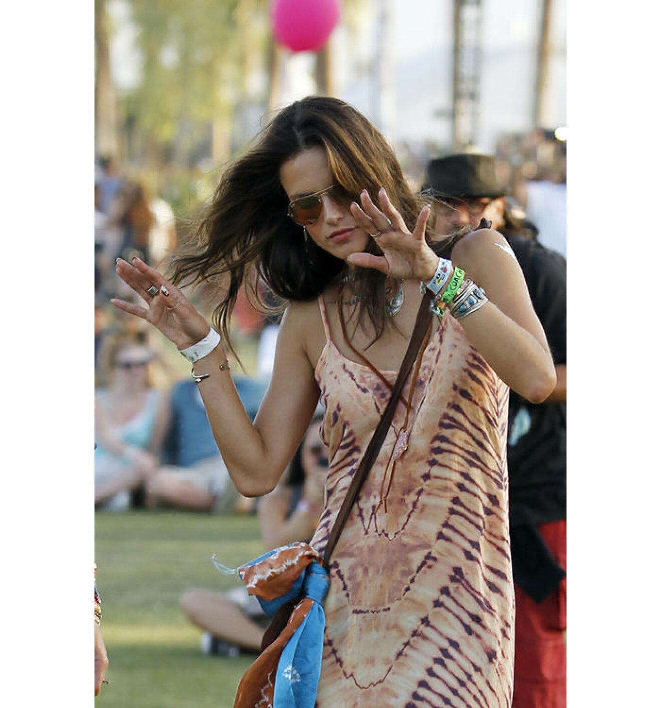 Victorias Secret model Alessandra Ambrosio parties it up at Coachella music festival and even has some temporary gold and silver tattoos for the occasion in Indio