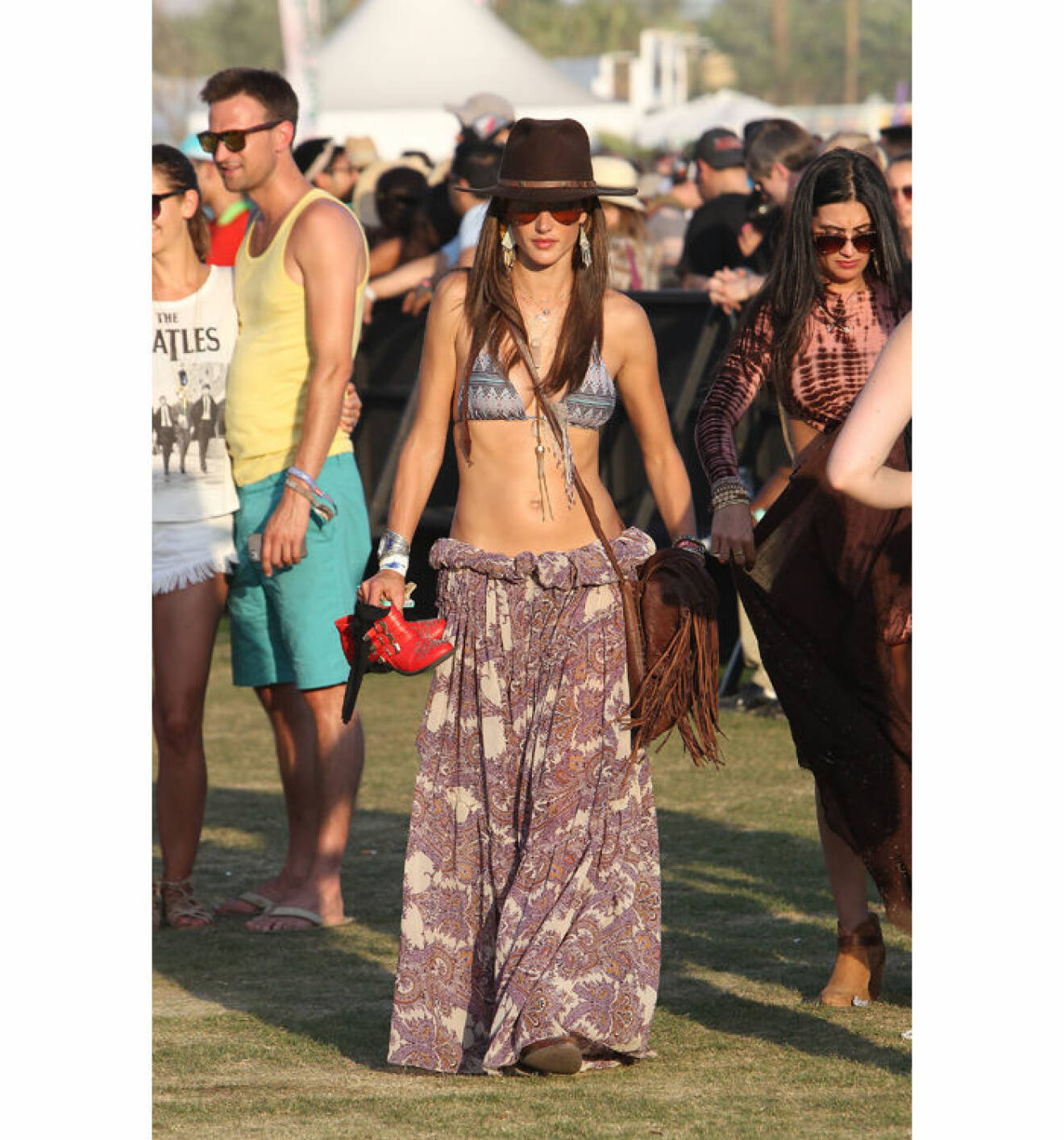 EXCLUSIVE: Alessandra Ambrosio rolls down her dress and shows a little skin at Coachella
