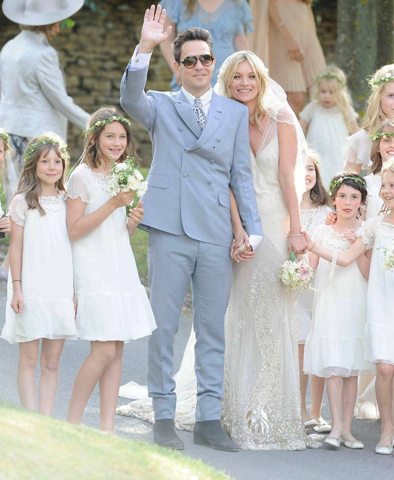 01.JULY.2011. SOUTHROP  KATE MOSS WITH HER DAUGHTER LILA AND JAMIE HINCE AT THE KATE MOSS AND JAMIE HINCE WEDDING CEREMONY HELD AT SOUTHROP VILLAGE IN THE COTSWOLDS.