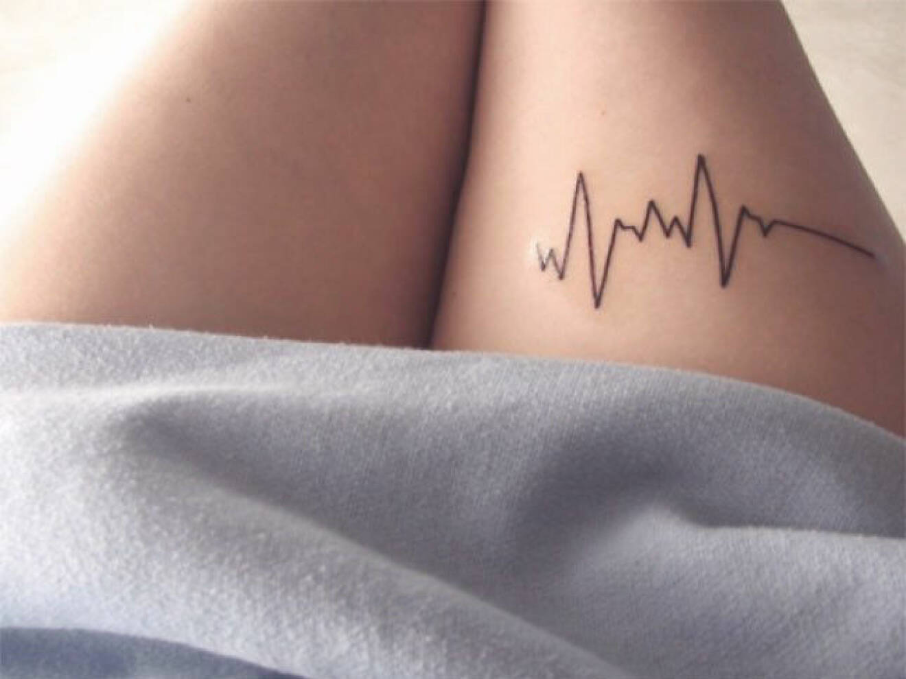 hjärtkurva tatuering