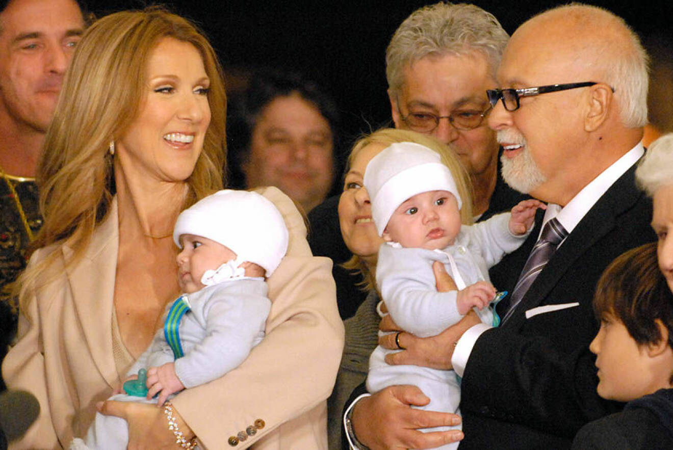 Celine Dion and husband Rene Angelil with twins Nelson and Eddy and son Rene-Charles and mother Therese, far right