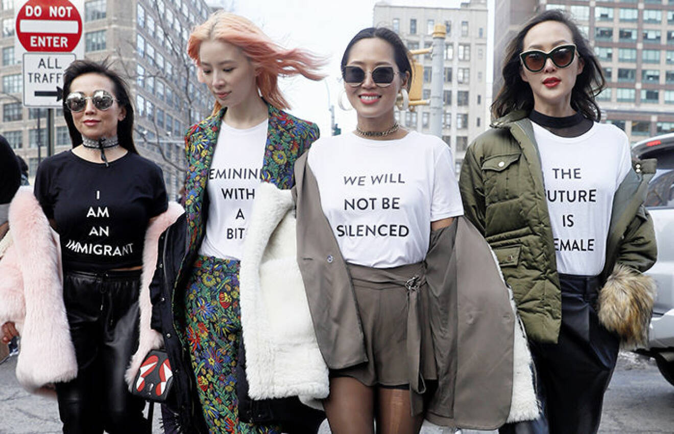 Kvinnor med tröjor med texten " We will not be silenced" och " The future is female"
