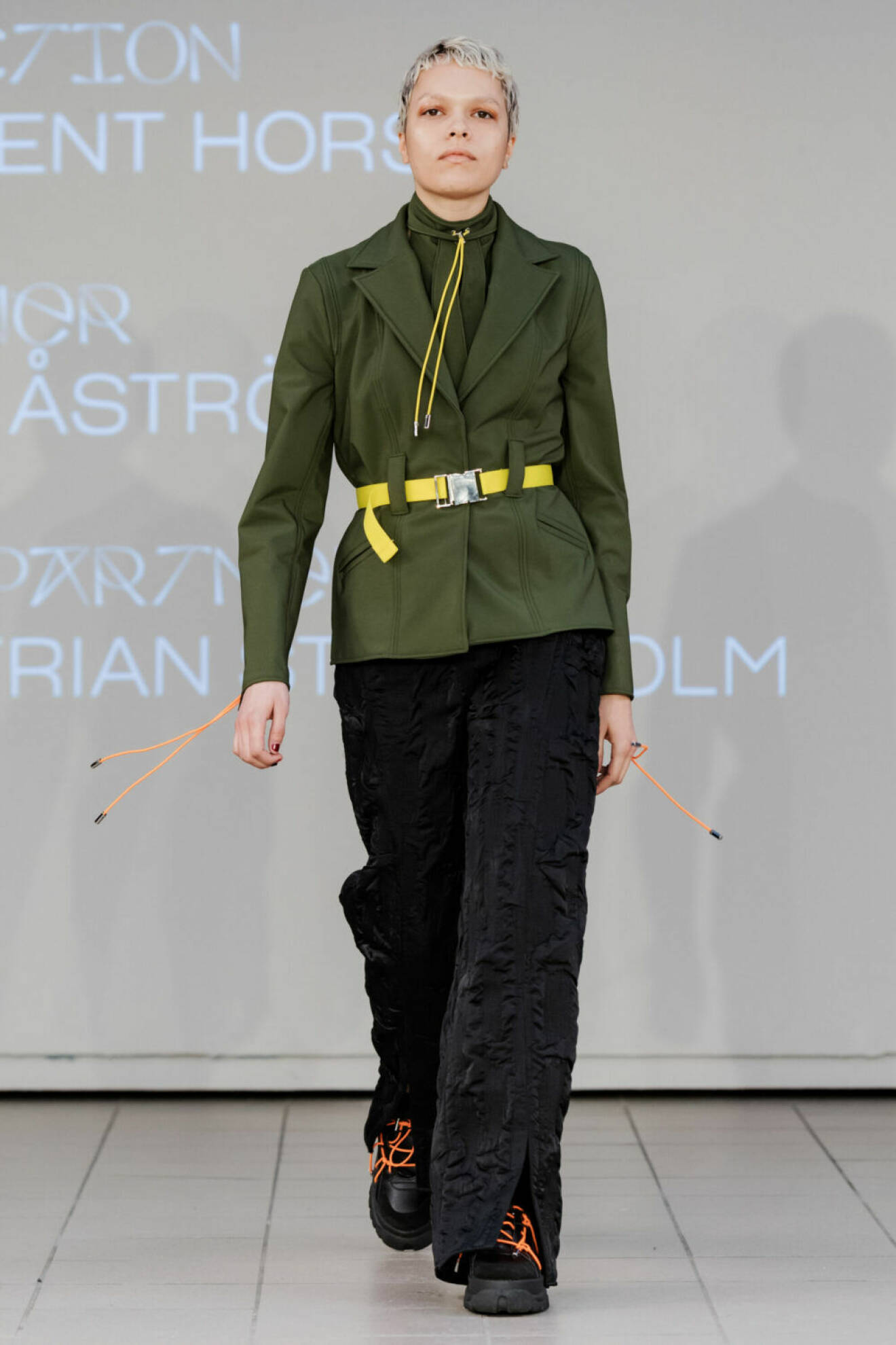 Beckmans collage of fashion AW19, grön jacka.