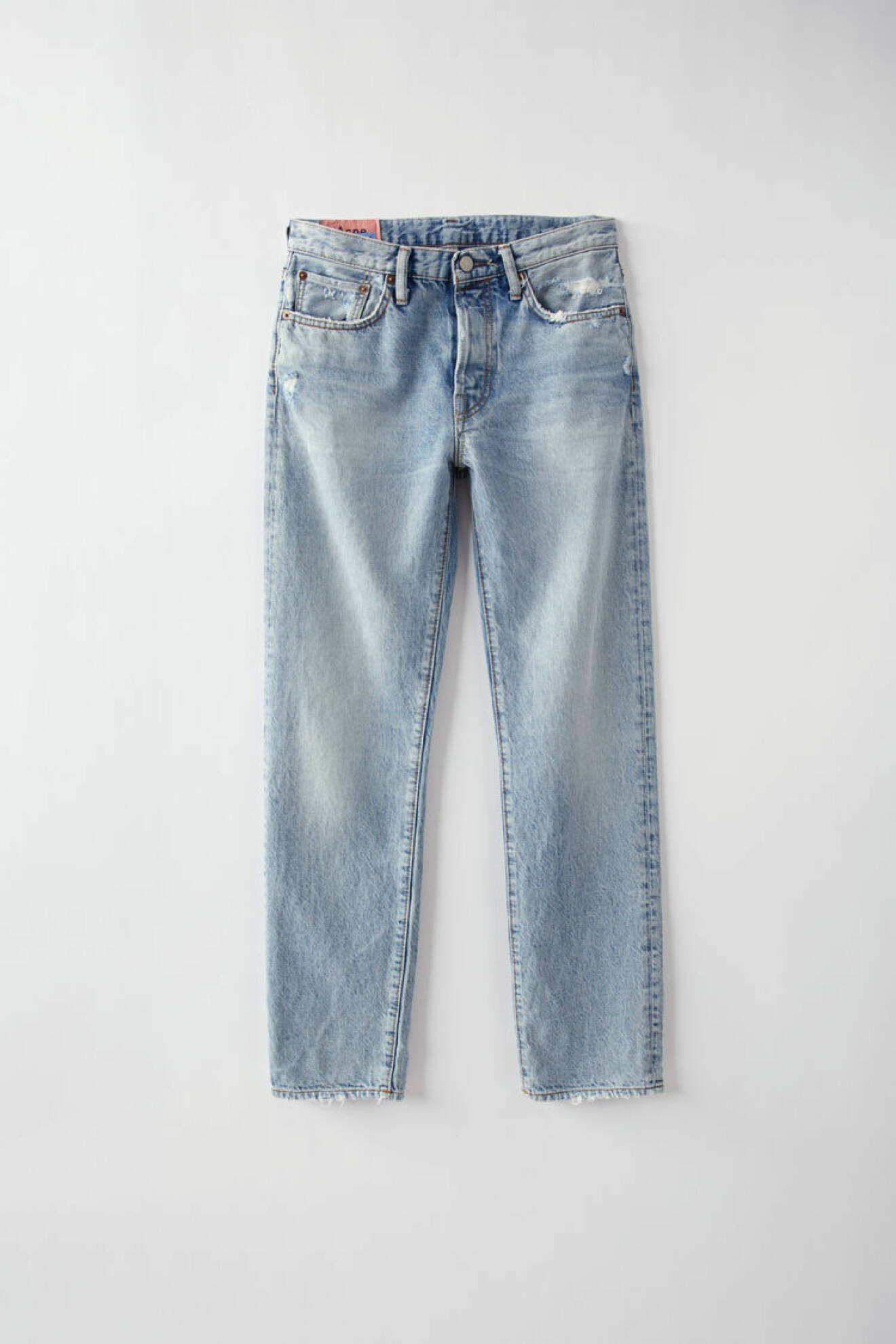 Klassiska jeans med slitna detaljer och ljus tvätt från Acne Studios. 