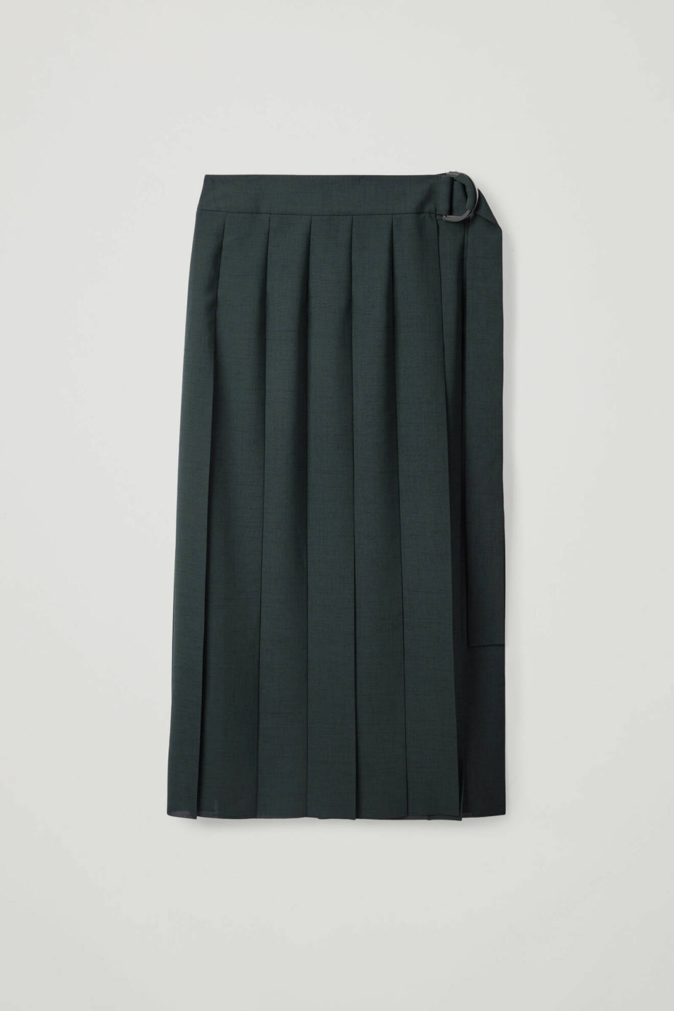 Plisserad kjol i en mörk nyans av grön från COS.