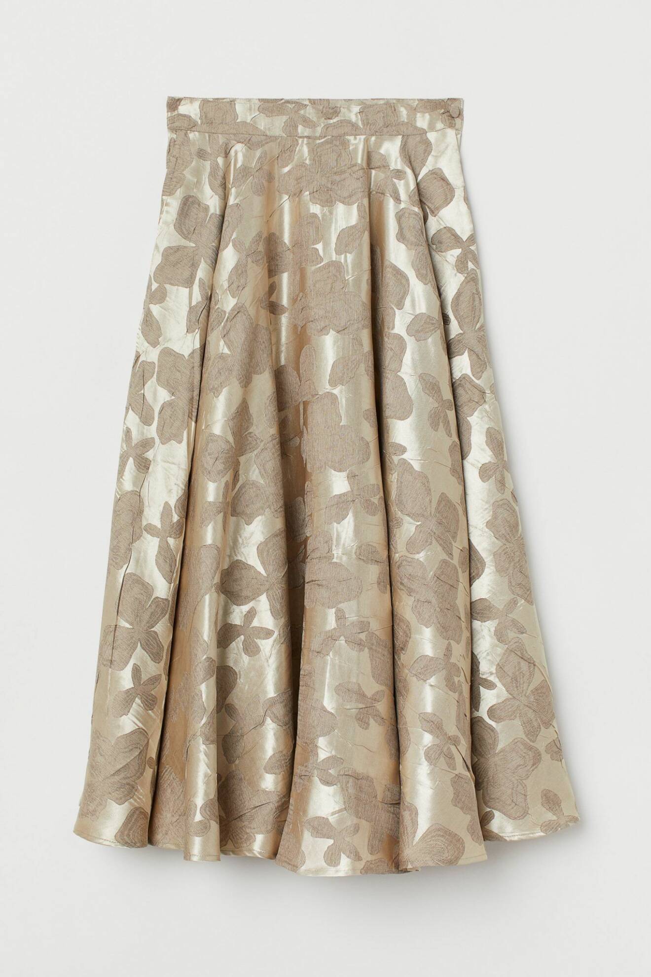 Högmidjad kjol från H&M i en dov nyans av guld och ett vackert blommönster.