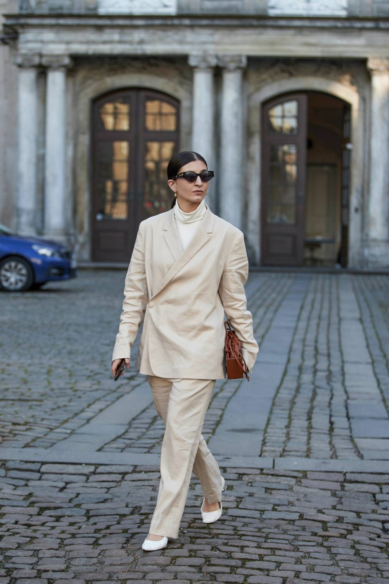 Katarina Petrovic i beige look under Copenhagen Fashion Week steetstyle.