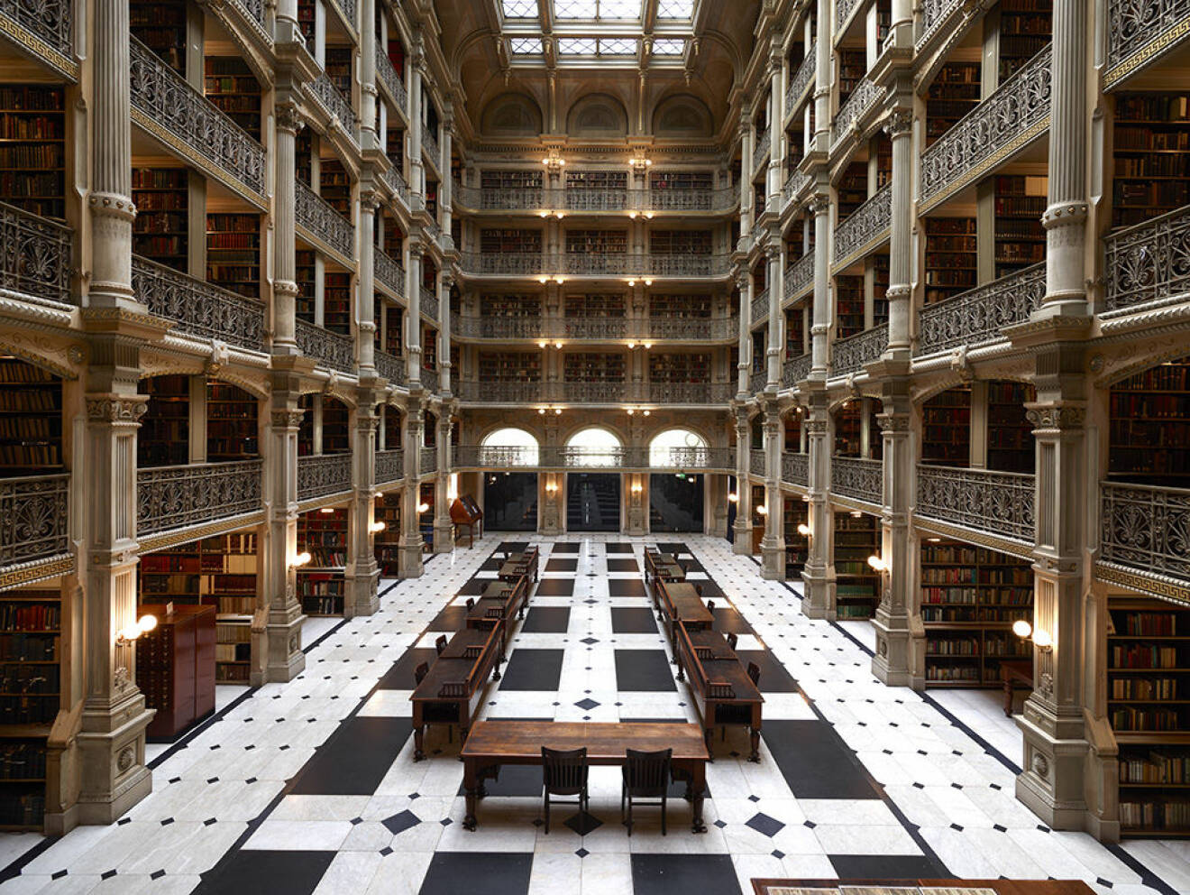 The George Peabody Library, formerly the Library of the Peabody Institute of the City of Baltimore, dates from the founding of the Peabody Institute in 1857. In that year, George Peabody, a Massachusetts-born philanthropist, dedicated the Peabody Institute to the citizens of Baltimore in appreciation of their "kindness and hospitality." The Peabody Library building, which opened in 1878, was designed by Baltimore architect Edmund G. Lind, in collaboration with the first provost, Dr. Nathaniel H. Morison. Renowned for its striking architectural interior, the Peabody Stack Room contains five tiers of ornamental cast-iron balconies, which rise dramatically to the skylight 61 feet above the floor. The ironwork was fabricated by the Bartlett-Robbins Company. The George Peabody Library is part of Johns Hopkins Sheridan Libraries.