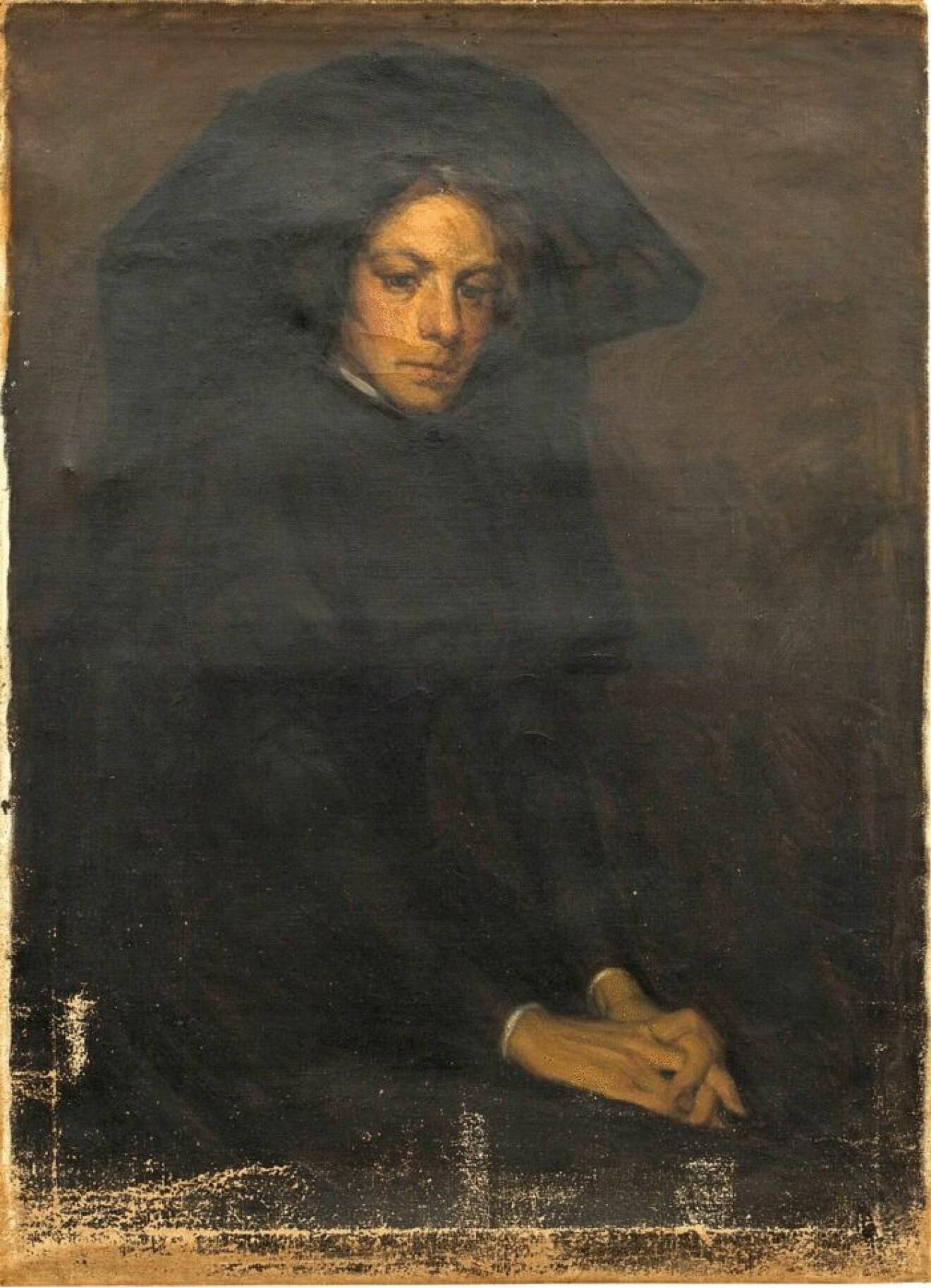 I sorg – porträtt av dam i svart