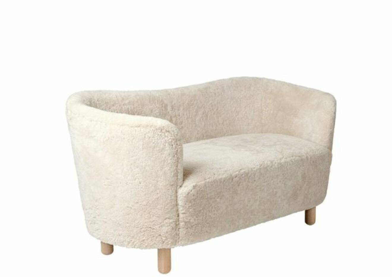 Härlig soffa som för tankarna till ull och hög bekvämlighet