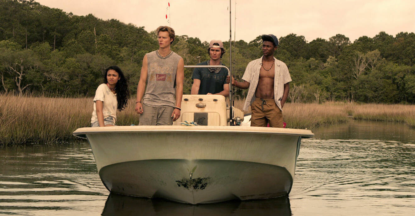 En båt med skådespelarna i outer banks