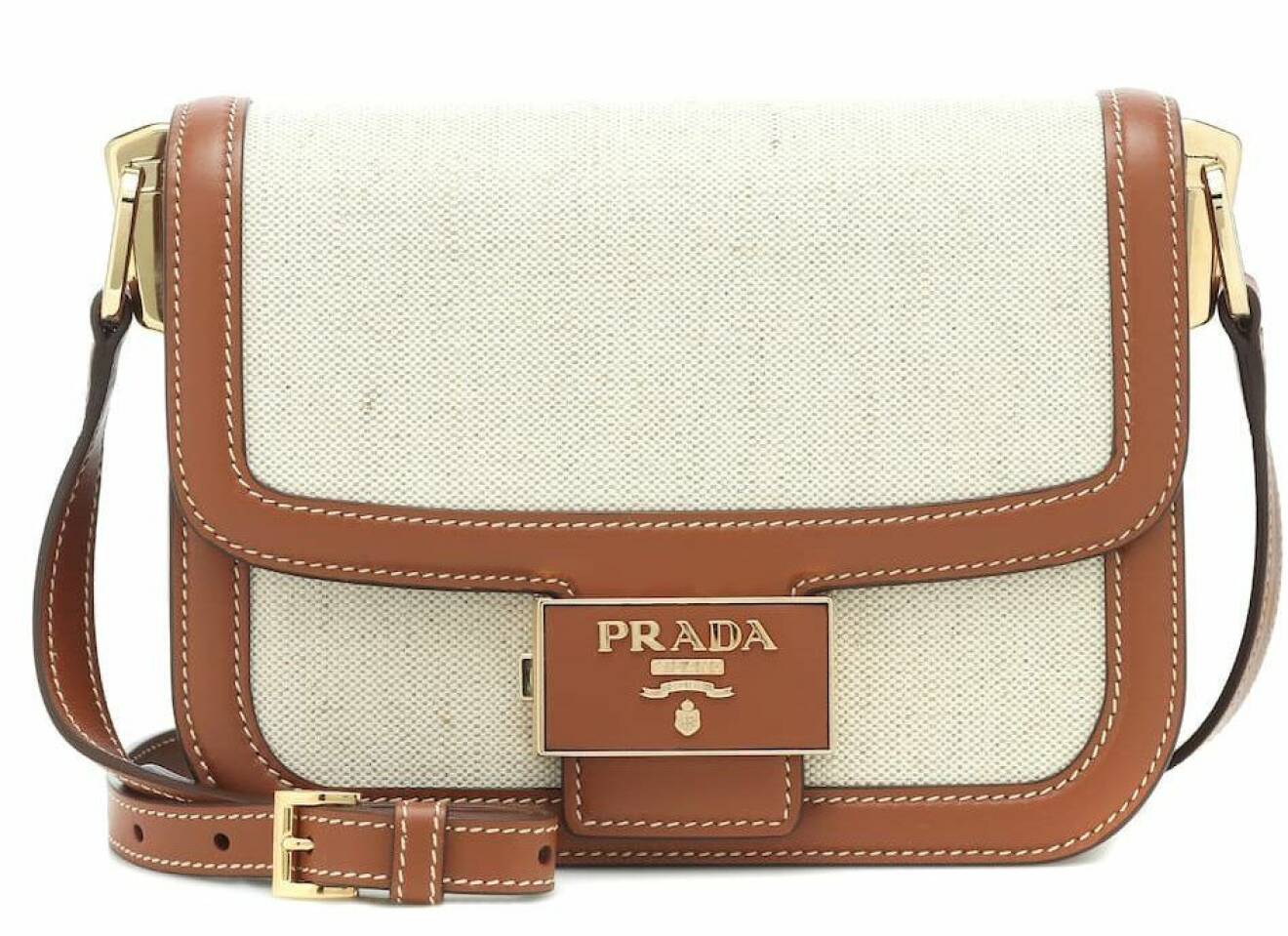 Beige väska från Prada med bruna läderdetaljer.