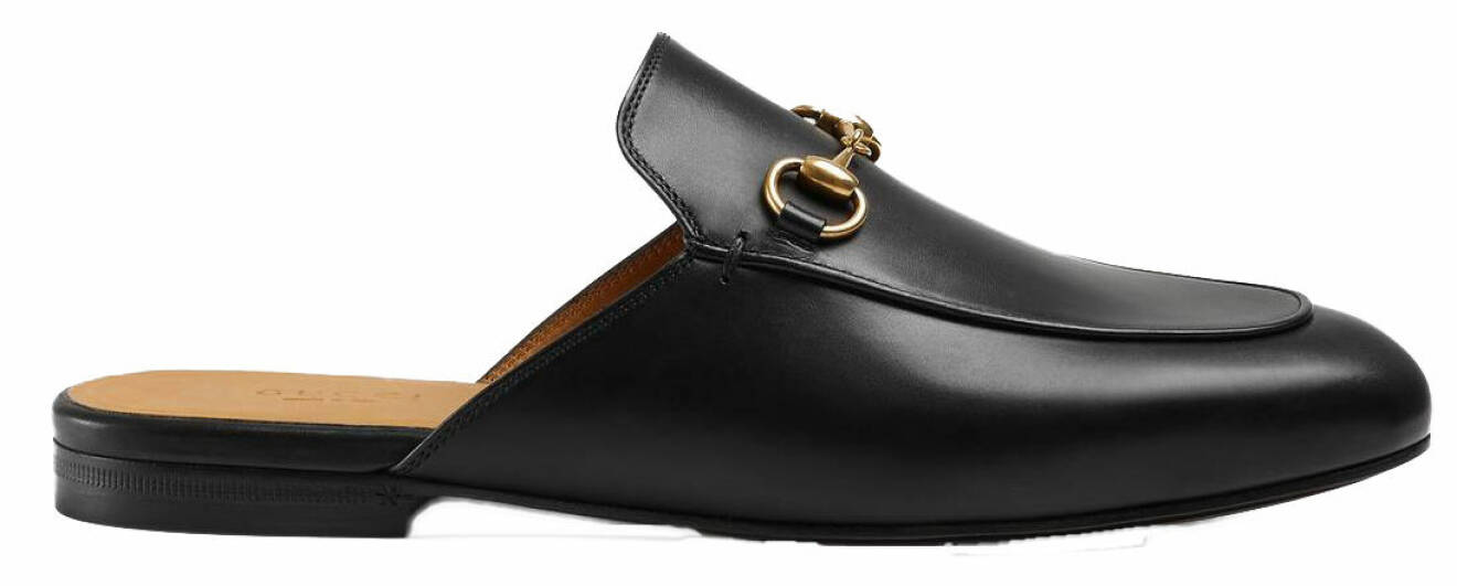 Klassiska slip-in sandaler från Gucci i svart.