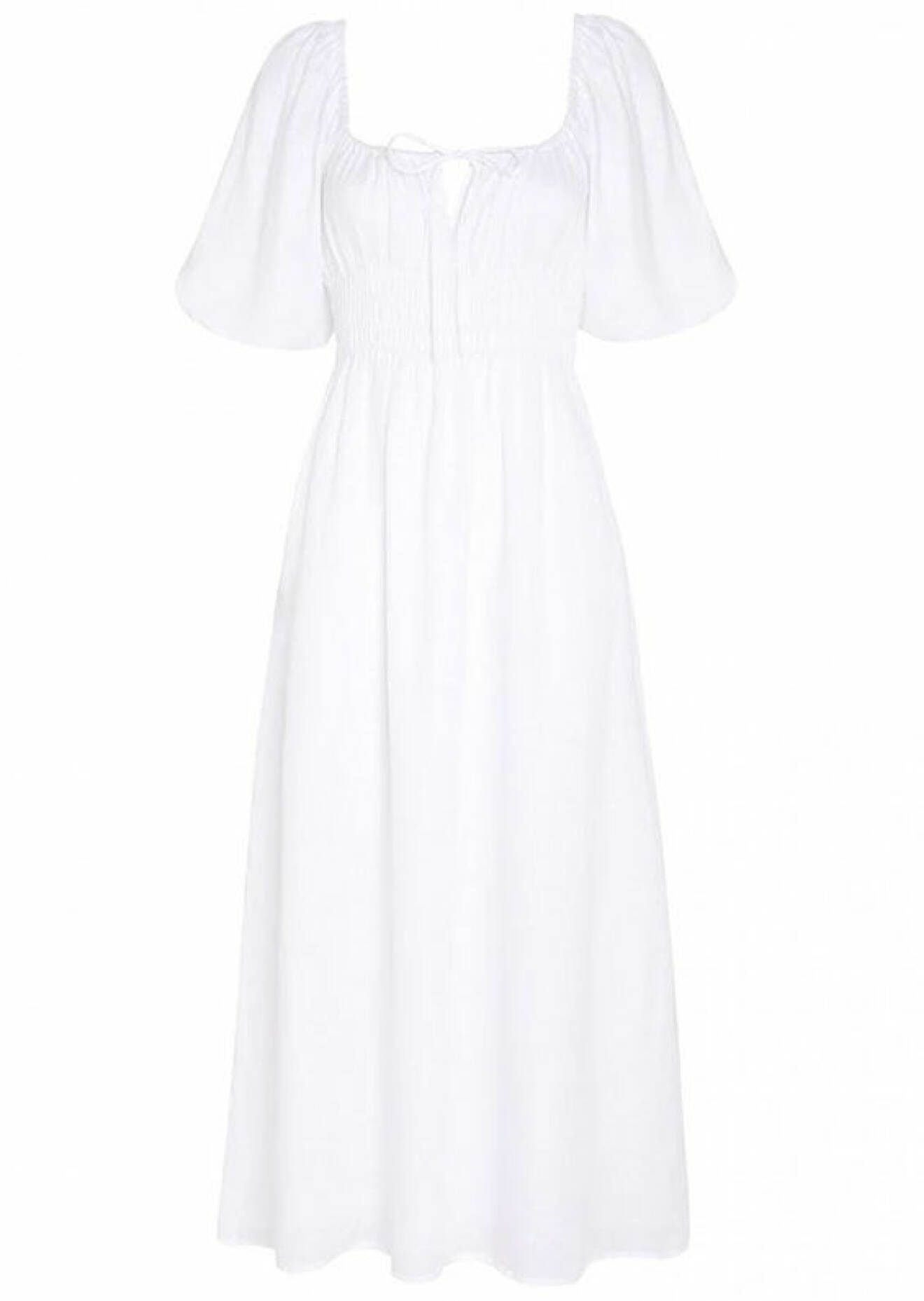 vit klänning med puffärmar