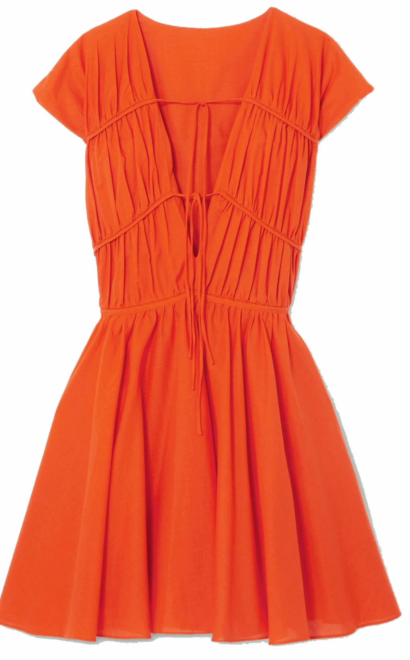 Kort klänning i brinnande orange från Tove studio, finns att köpa här.