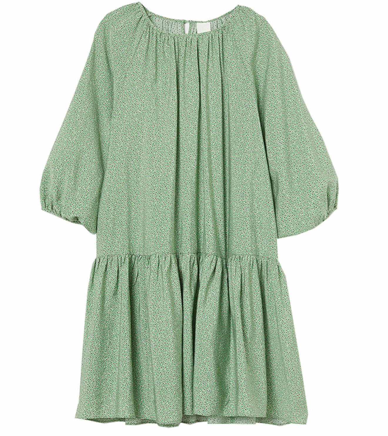 grön mönstrad a-linjeformad klänning