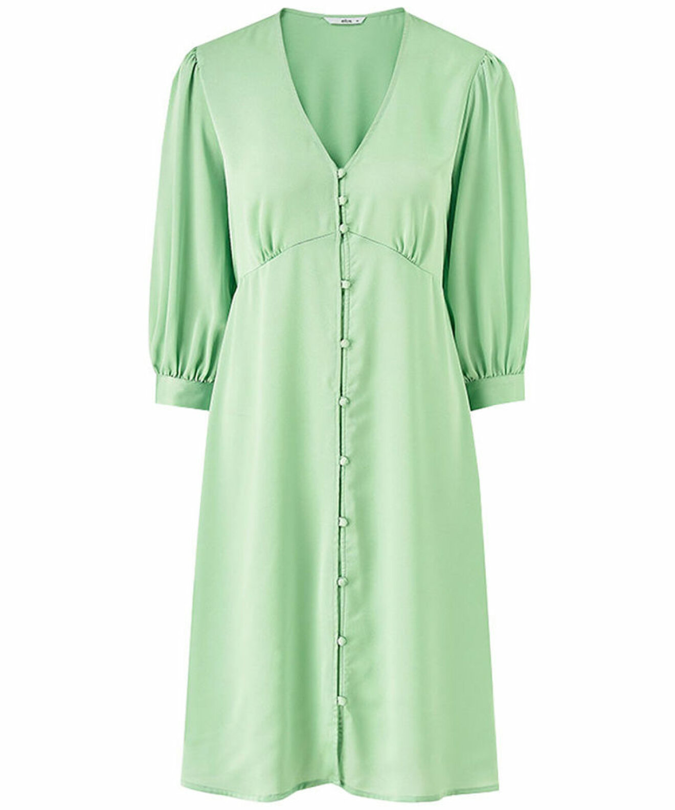 grön V-ringad klänning med knappar till sommaren 2021