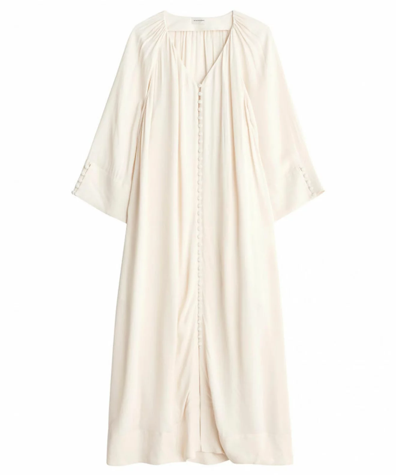 vit V-ringad klänning med knappar till sommaren 2021