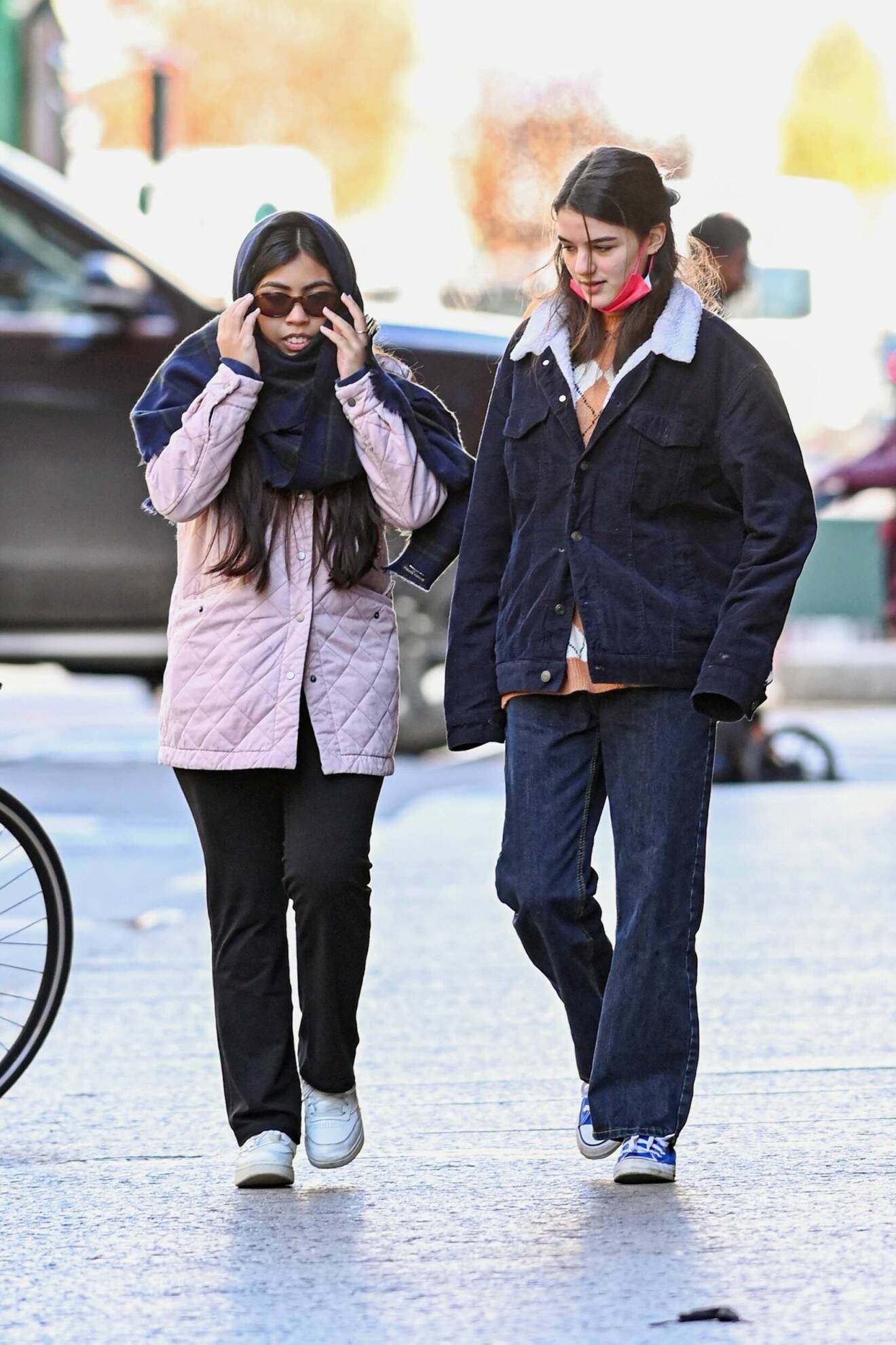 New York, NY - Grown up Suri Cruise is joined by a friend for a friendly stroll through New York City