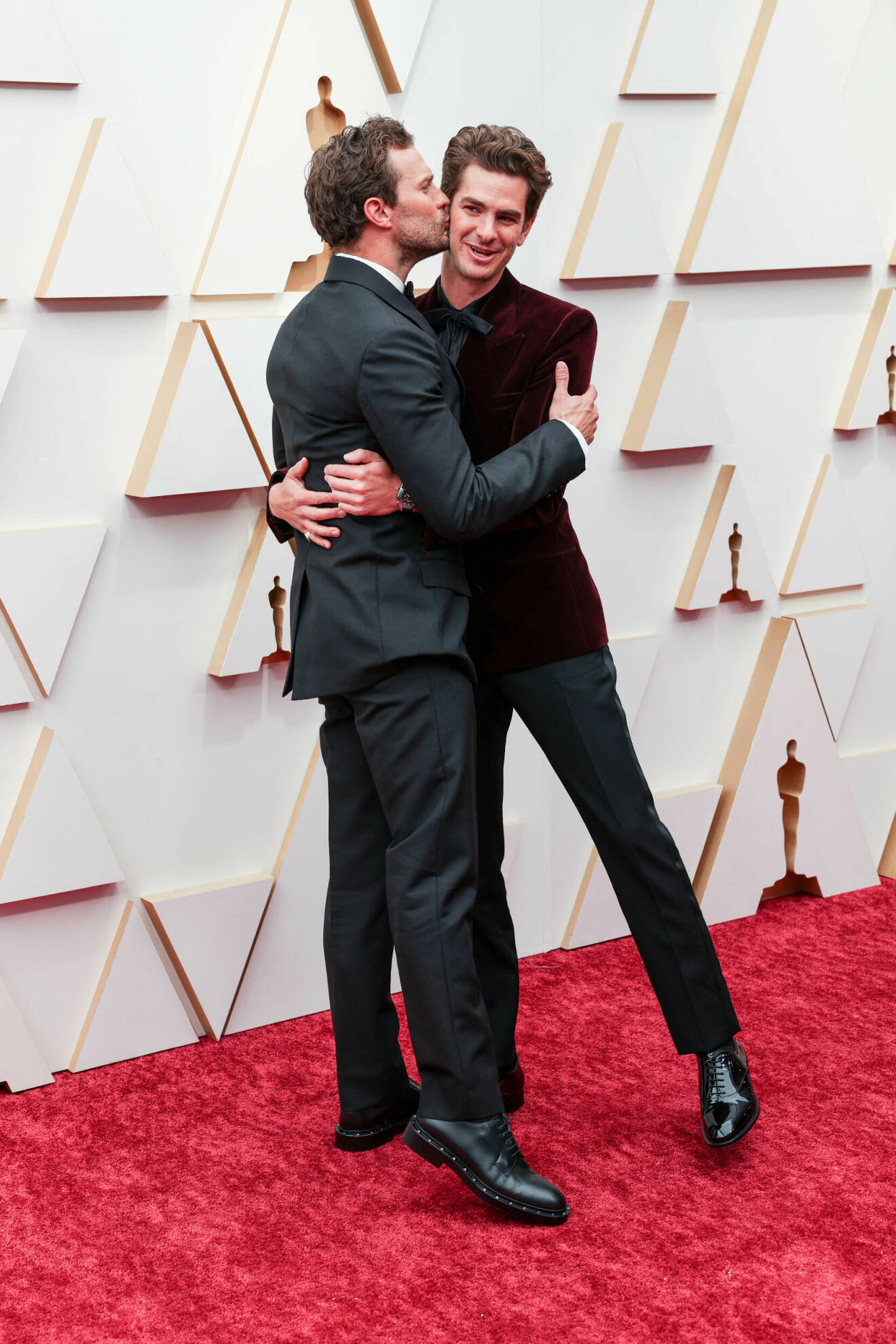 Jamie Dornan och Andrew Garfield på Oscarsgalan 2022