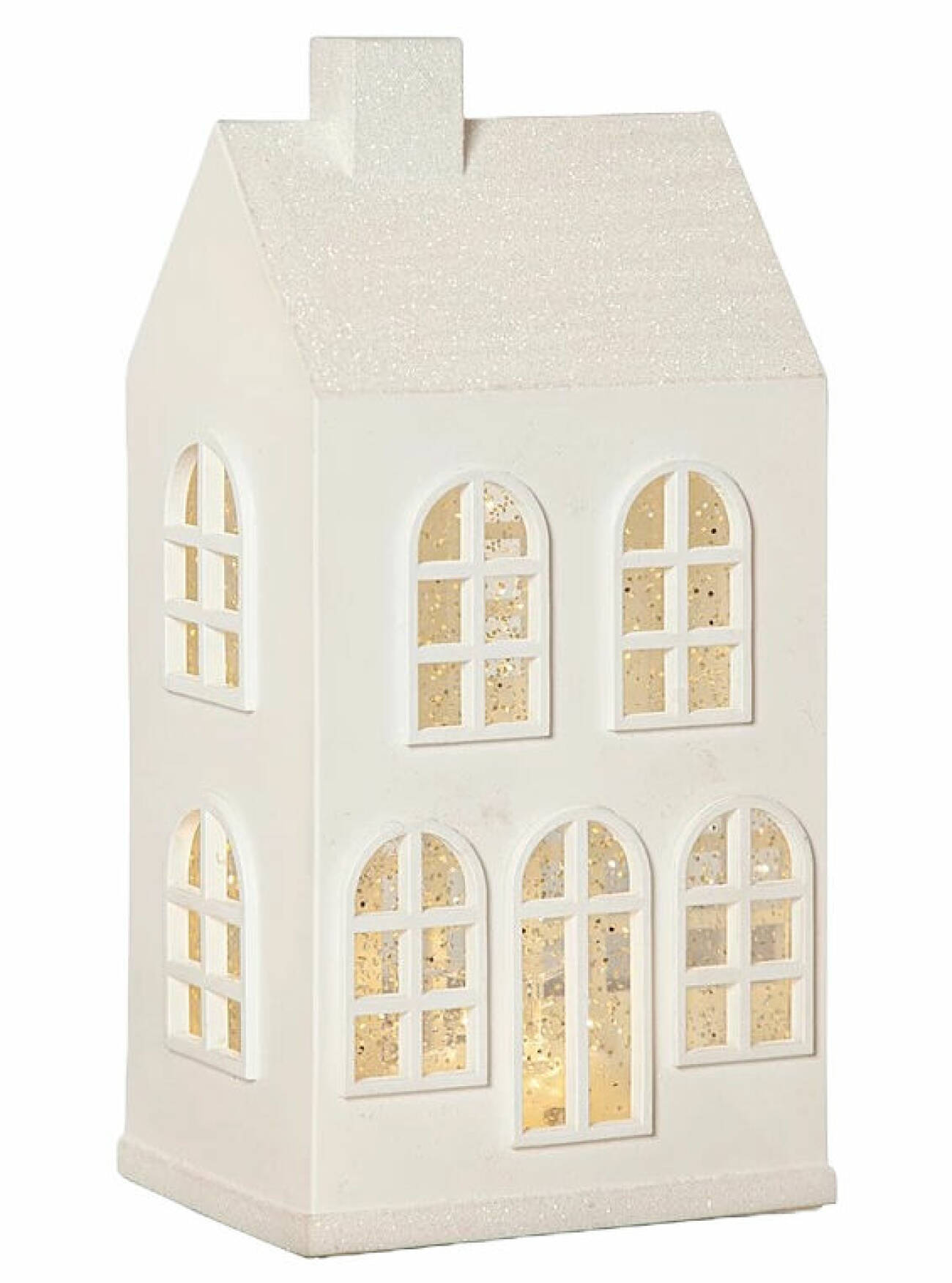 vitt hus som juldekoration med lyse