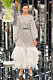 Karl Lagerfelds design för Chanel, fjäderklänning med glitter.